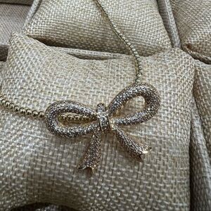 Gold over silver beaded chain with bow cz necklace